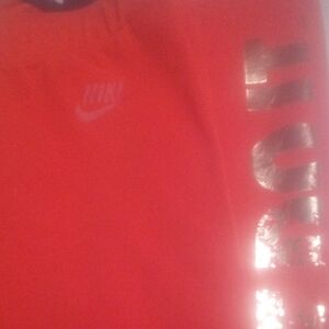Nike Red Shirt with Gold Lettering